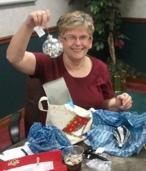 Judy Hoffman Showing off her New Ornament